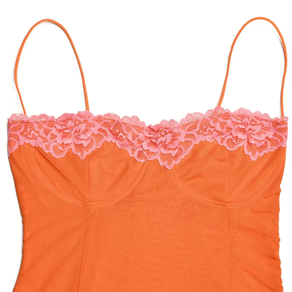 Orange tank top with pink lace trim on a white background